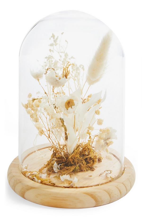 Terrarium sous cloche en verre avec fleurs séchées