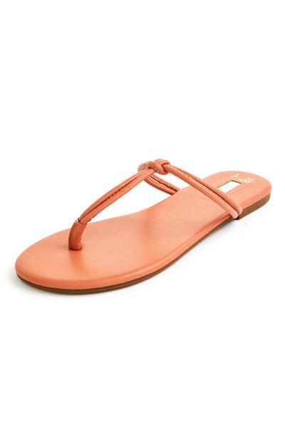 Oranžne sandale z vozlom in paščkom za palec