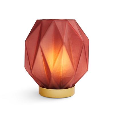 Różowa lampa szklana o geometrycznym kształcie