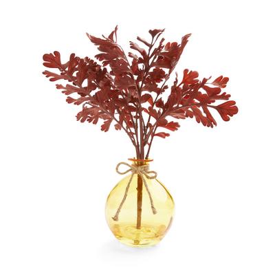 Faux Maple Leaves In Round Amber Vase