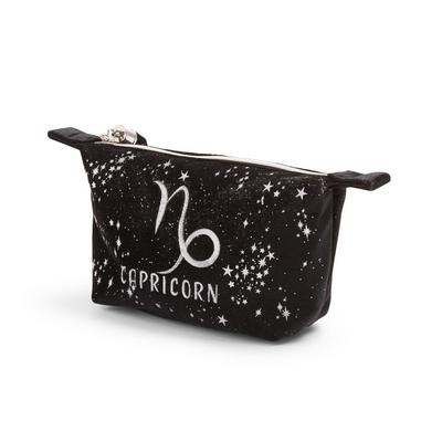 Črna žametna torbica za ličila s simbolom za astrološko znamenje kozorog