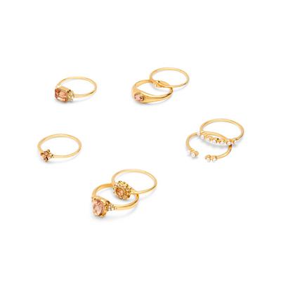 Pack de 8 anillos dorados finos con pedrería rosada