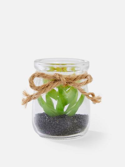 Mini glazen vaasjes met kunstvetplanten