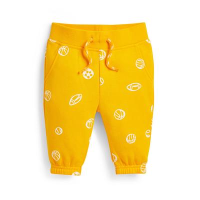 Rumene fantovske hlače za prosti čas s športnim potiskom za dojenčke