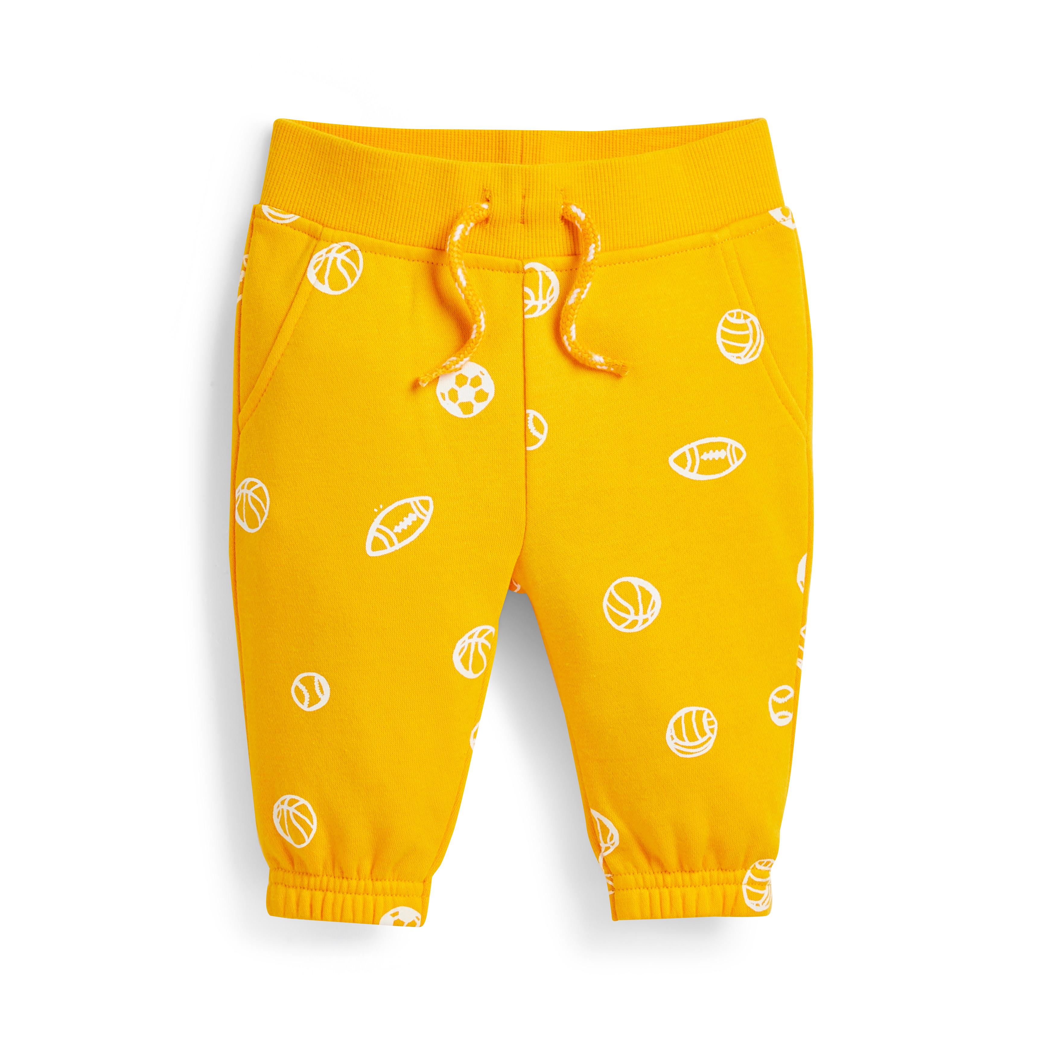 Pantalones de chándal amarillos con estampado deportivo para bebé niño | Ropa de bebé niño | Moda para bebés | Ropa para niños | Todos los productos Primark | Primark España