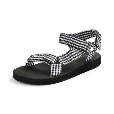 Zwart-witte sandalen met enkelbandje