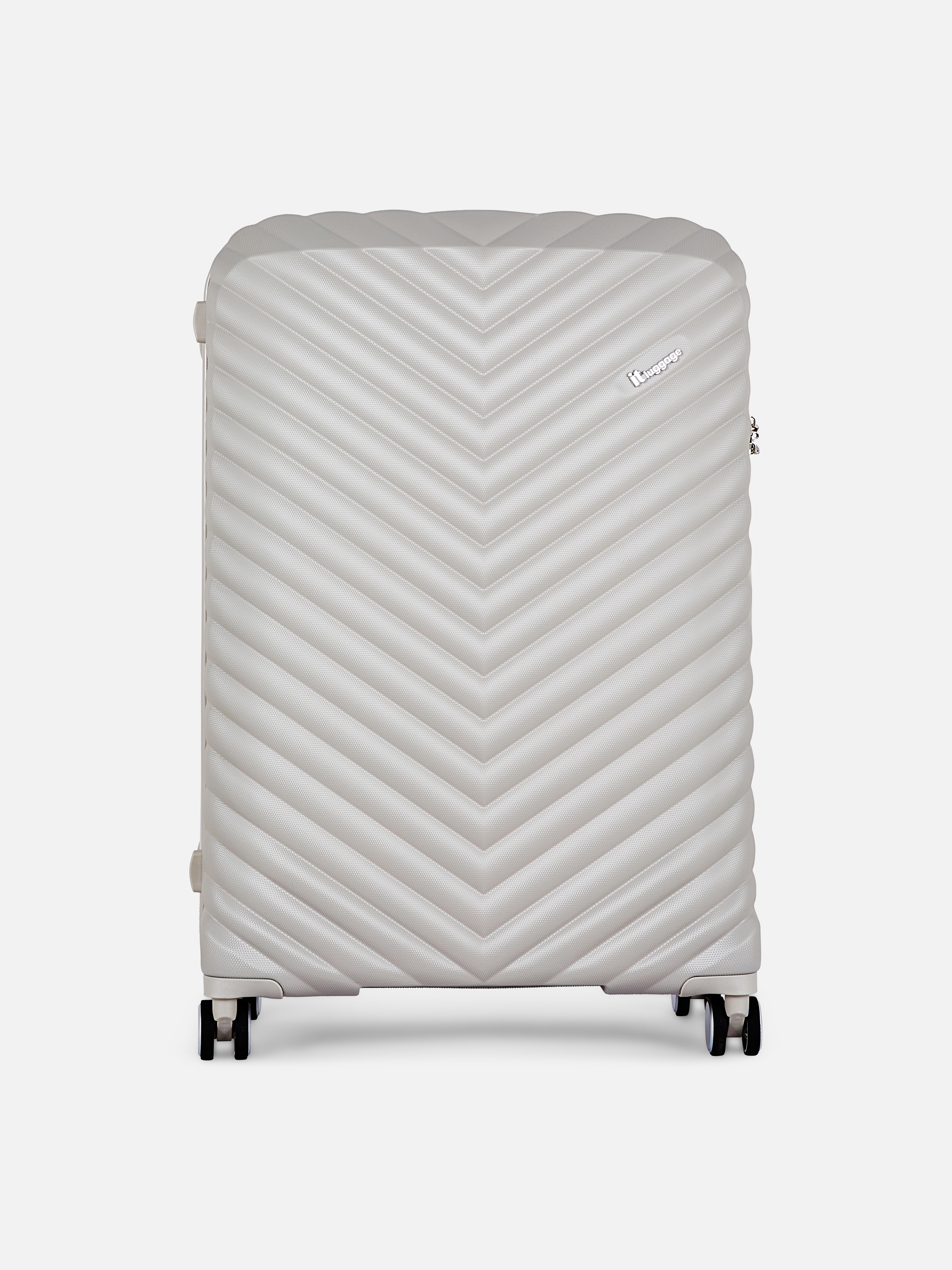 Maleta rígida con diseño de espiga | Equipaje y artículos básicos de viaje | Adornos de temporada para hogar | Todos los productos Primark | Primark España